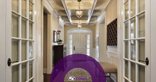 Long corridor leading to front door of a home