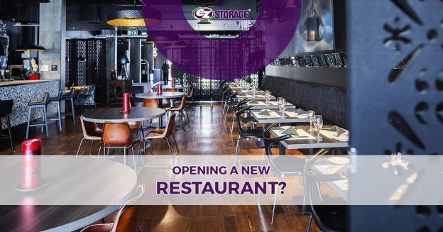 The inside of an empty restaurant with tables set up for customers