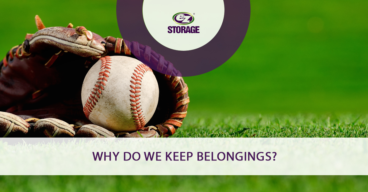 Baseball inside baseball mitt on top of the grass and text "Why do we keep belongings?"