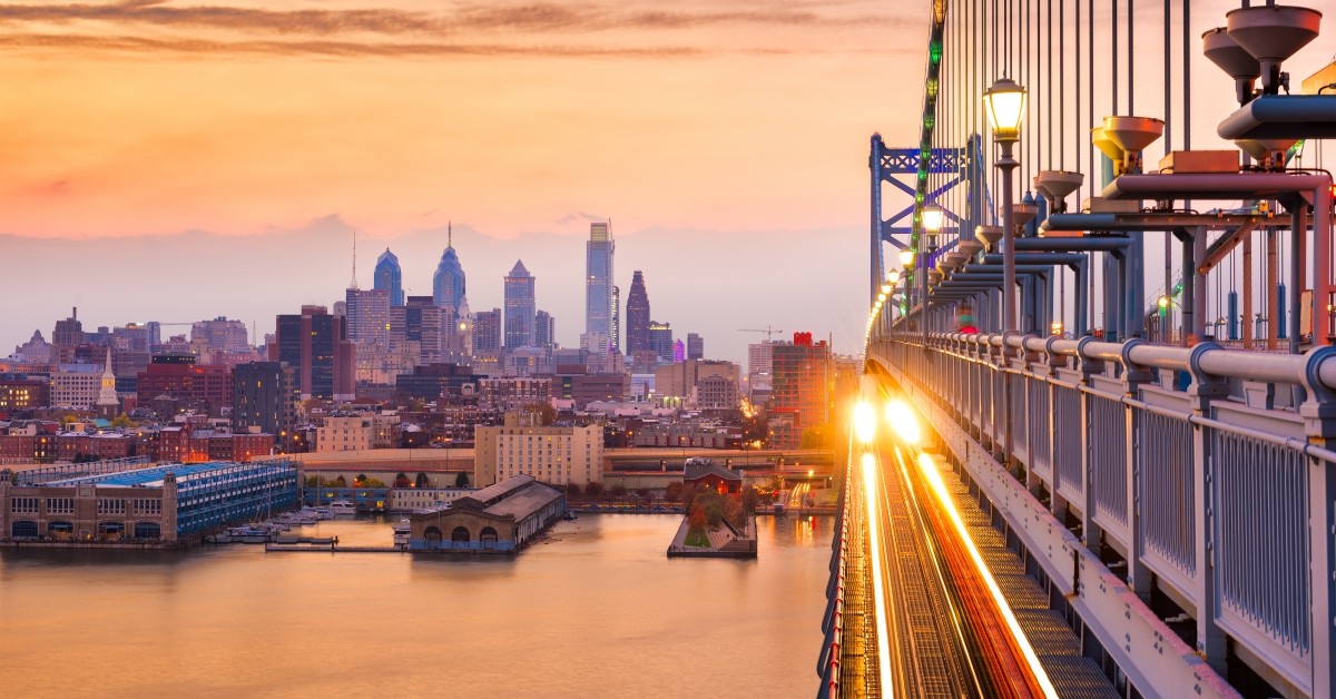 Philadelphia skyline and bridge at sunset