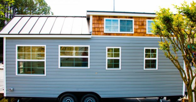 Blue portable house on wheels